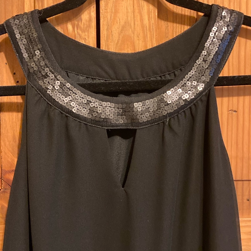 Beautiful Black Dress with sequins around neck area and back.